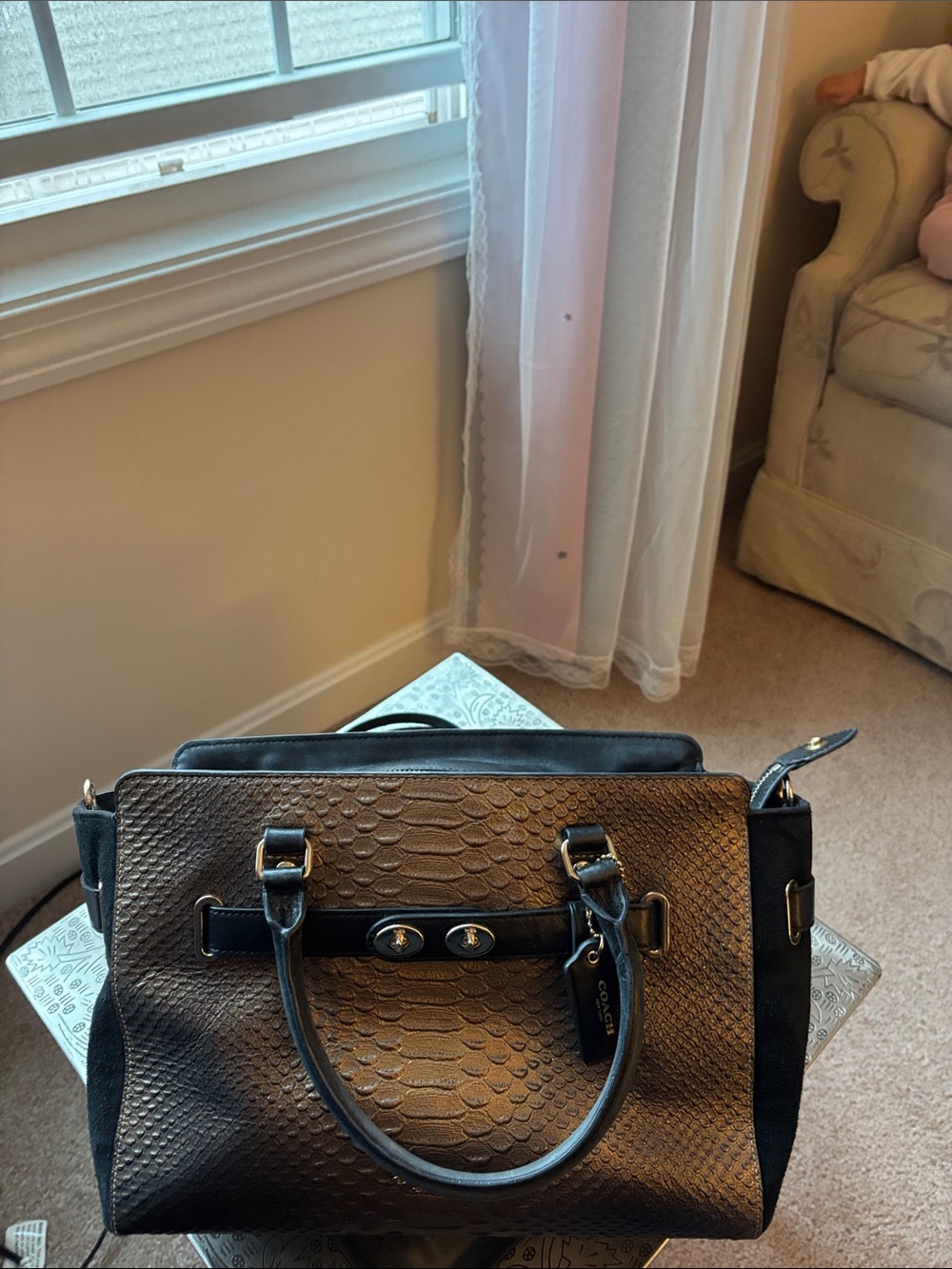Coach Bake Carryall from the swagger line.
